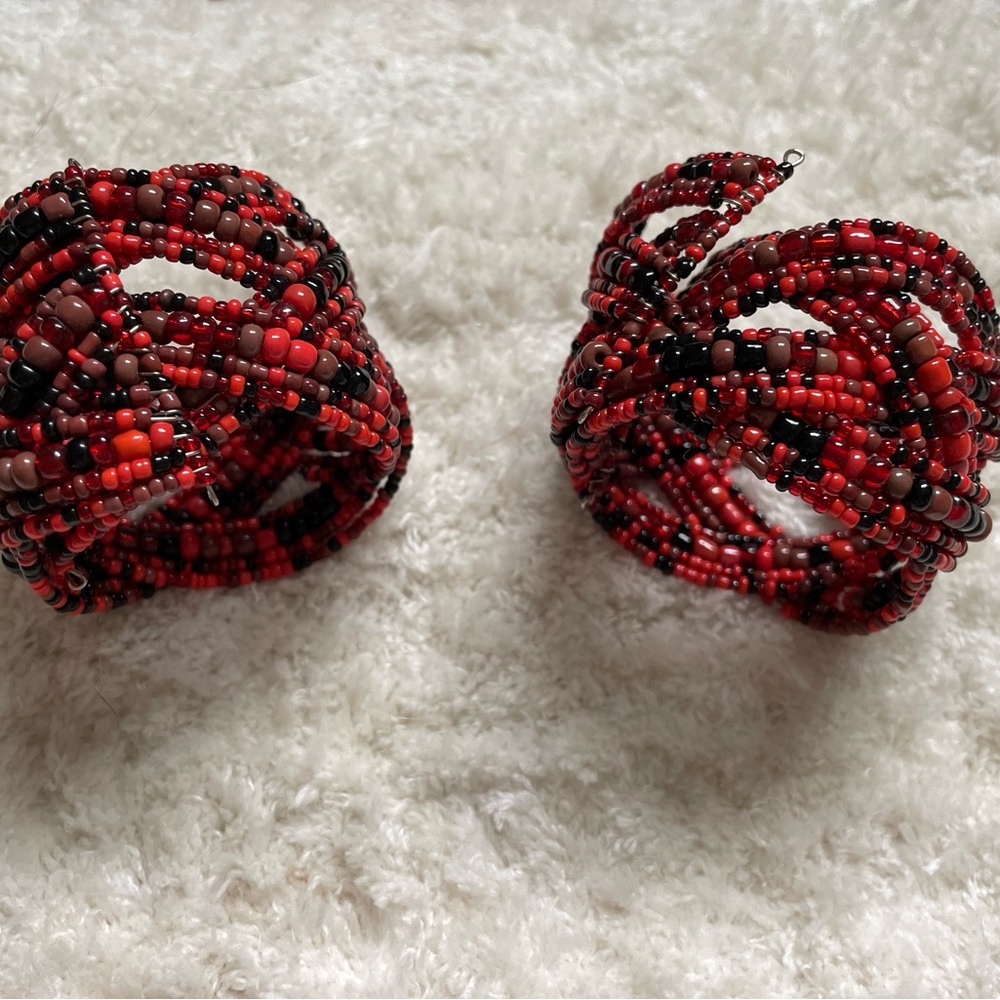 Red and Black Beaded Bracelet with Intricate Design